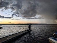 Graner Lake and Couple standing on dock