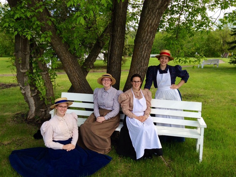 4 Women next to Bench